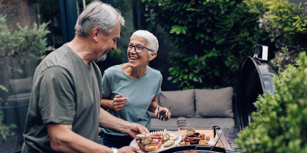 Illustratie man en vrouw bij BBQ